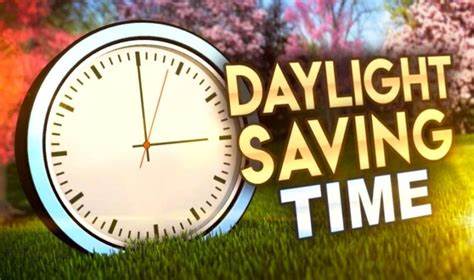 Photo of a clock with the words Daylight Savings TIme